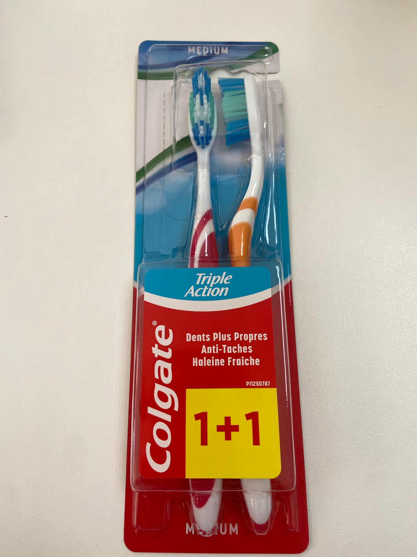 colgate triple action twin duo toothbrush